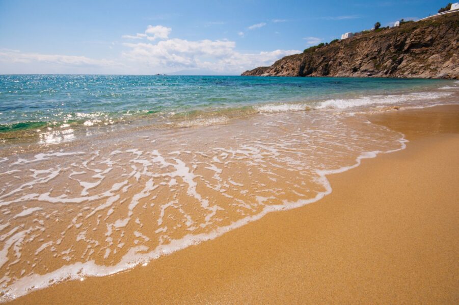 Luxevacay - Mykonos Tourism - Crystal Clear Waters and Sandy Shores